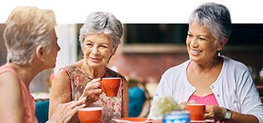 senior female friends enjoying a lunch date