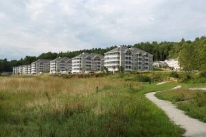 Outdoor view of the Covenant Living of Keene building from an open field