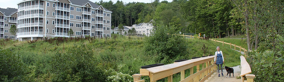 Covenant Keene apartments next to a walking trail