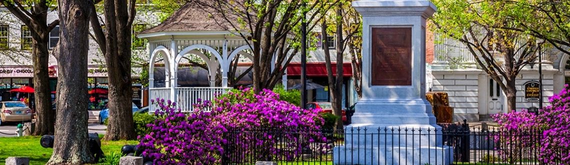 Keene town-square with a gazebo and monument